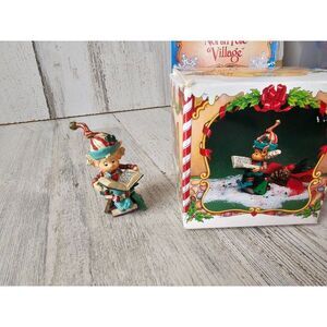 Enesco snippit book reading North Pole village Sandi zimnicki rare vintage villa